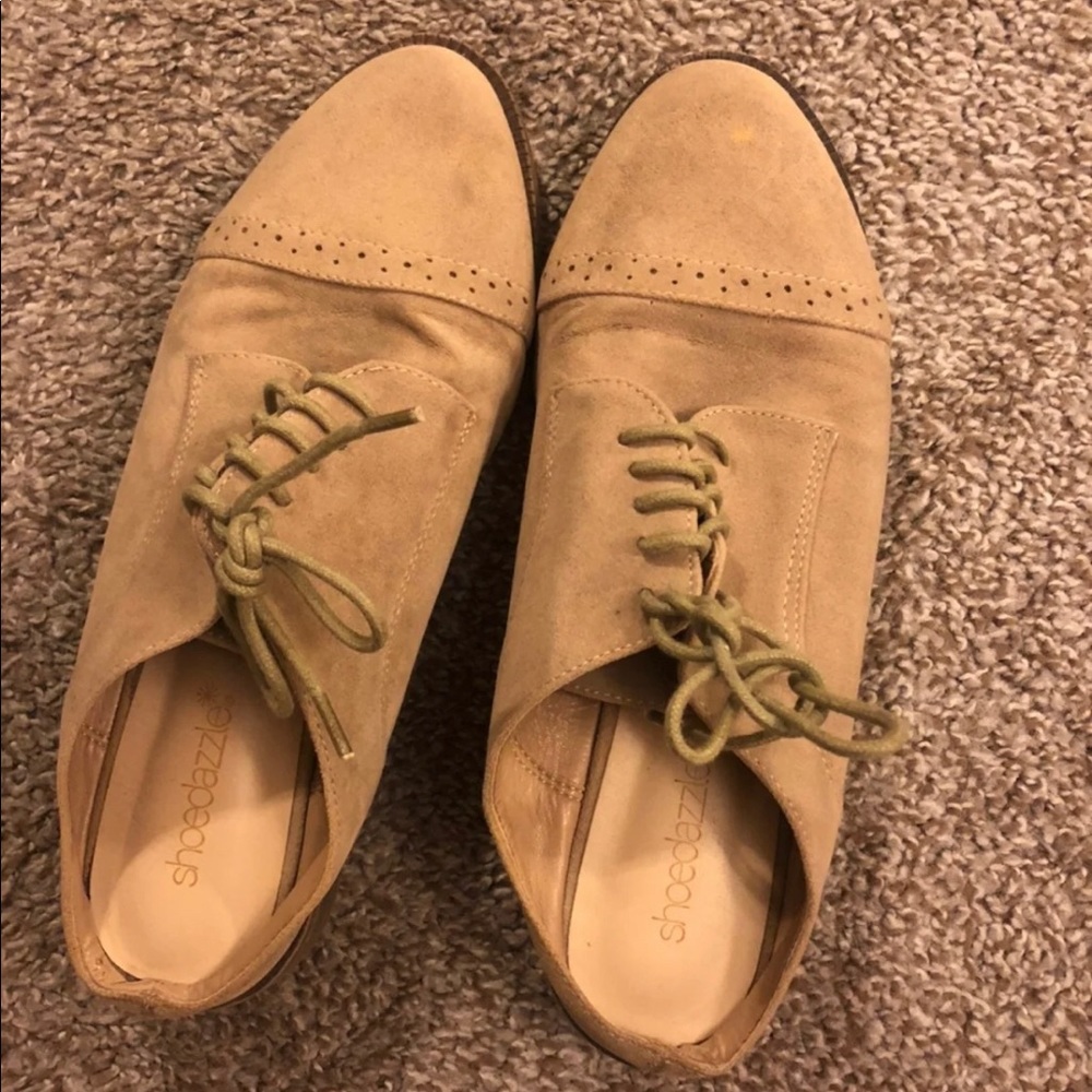 Tan slip on loafers with small heel - size 9